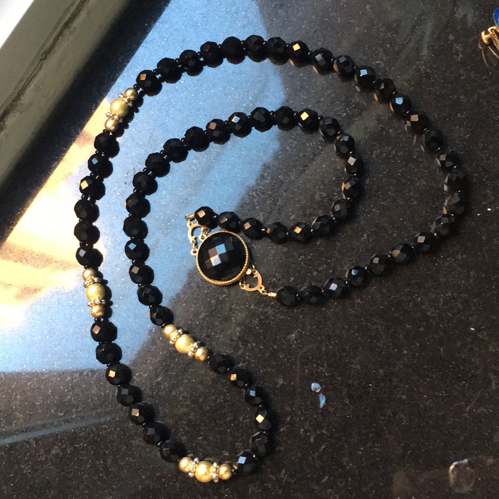 Black jet bead necklace w/ gold and silver beads.